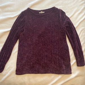 A soft, plum-colored, sweater. Made by Dana Buchman, a size small
